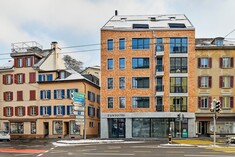 A shingle facade in the middle of Lucerne  